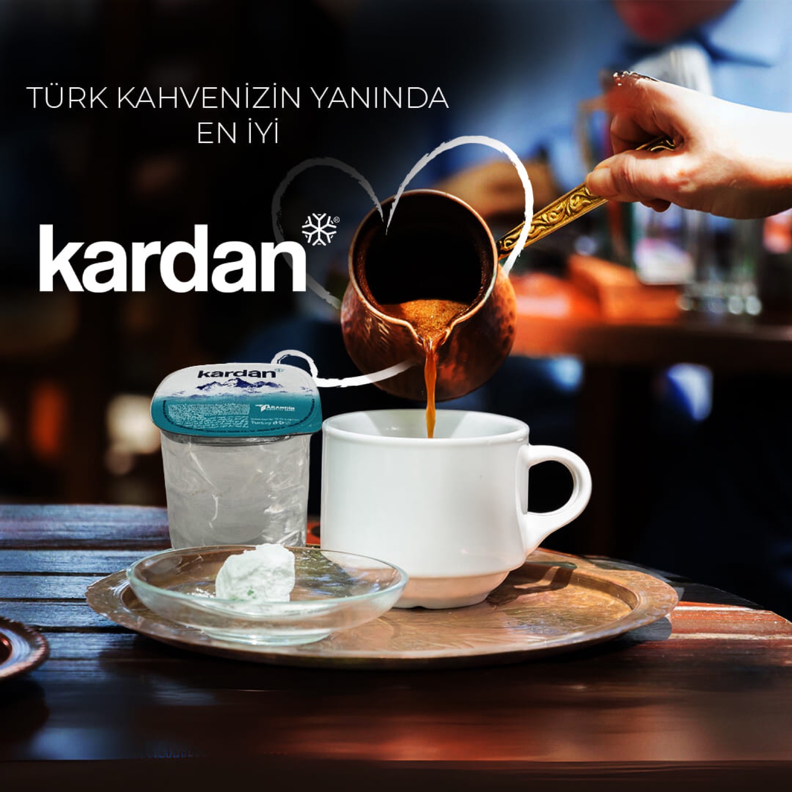 Kardan cup water served next to Turkish coffee